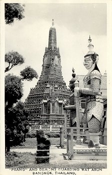 "Prang" and Demons Guarding Wat Arun Bangkok. Thailand.